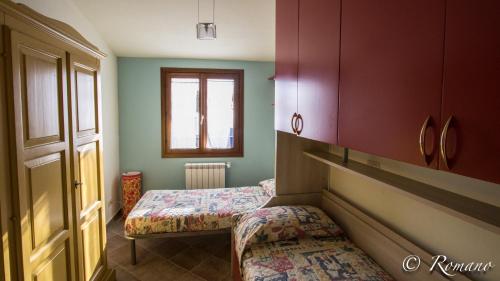 Tempat tidur dalam kamar di Villa Vigna