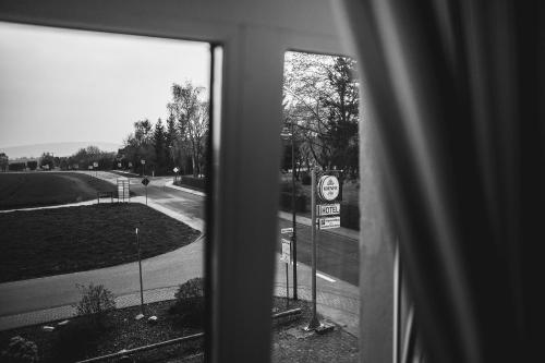 a view of a street from a window at Landhotel Airport-Inn in Lautzenhausen