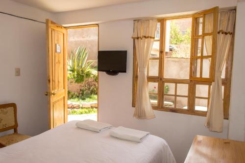 Katil atau katil-katil dalam bilik di Casa Don Jose B & B