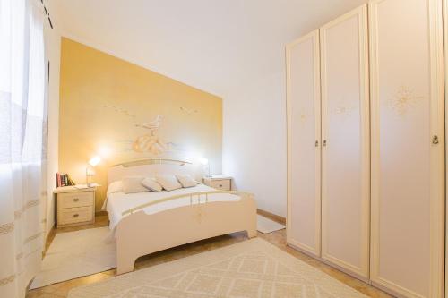 Säng eller sängar i ett rum på Tenute Costadoria (Valle di Cynara)