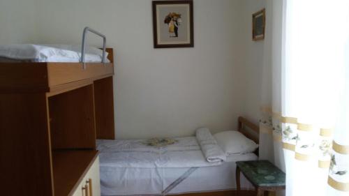 Postel nebo postele na pokoji v ubytování Apartment Botanicheskiy Sad