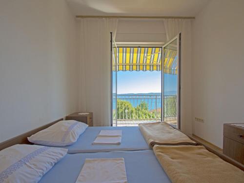 Postel nebo postele na pokoji v ubytování Apartments Antonio