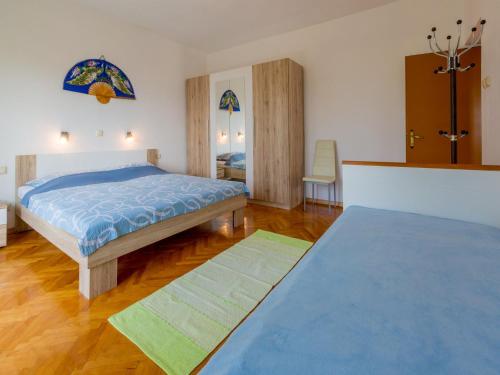 Posteľ alebo postele v izbe v ubytovaní Apartments SOBOL