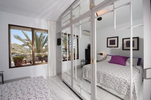 Postel nebo postele na pokoji v ubytování Apartamento en primera linea de mar