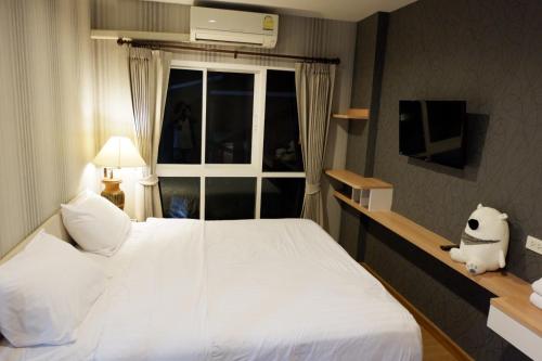 Gulta vai gultas numurā naktsmītnē The Sea Condo Cozy Private Room at Ao nang Krabi