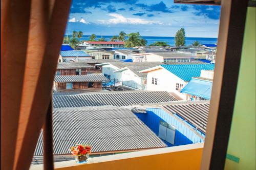 a view from a window of a city with buildings at Chomsin Hua Hin ชมสินธุ์ หัวหิน in Hua Hin