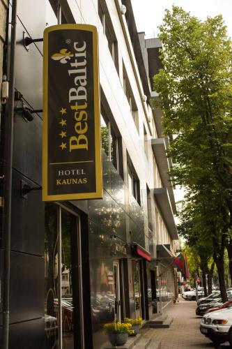 a sign on the side of a hotel karuitas at BEST BALTIC Kaunas in Kaunas