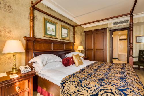 Postel nebo postele na pokoji v ubytování Gordion Hotel - Special Class