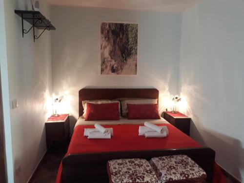 Ένα ή περισσότερα κρεβάτια σε δωμάτιο στο Bed And Breakfast Delle Grotte