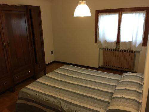 Cama o camas de una habitación en Casa Bellodi