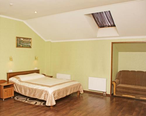 Een bed of bedden in een kamer bij SV Park Hotel