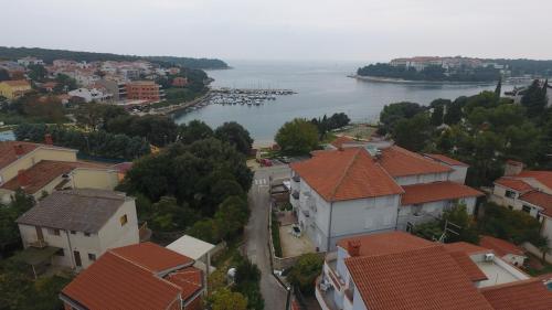 an aerial view of a town with a river and buildings at Rooms and Apartments Villa Dama in Pula
