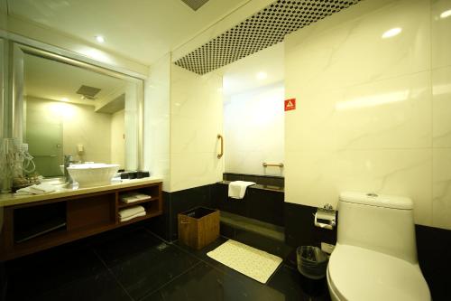 Ein Badezimmer in der Unterkunft Nest Hotel
