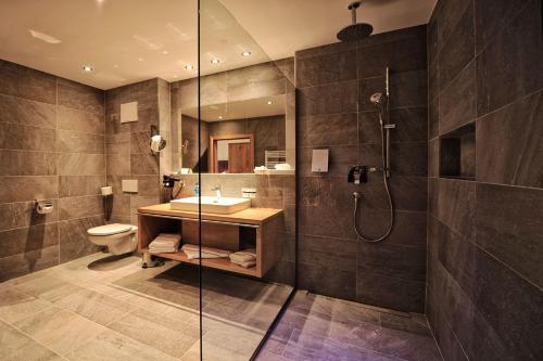 Koupelna v ubytování Hotel Dorfstadl