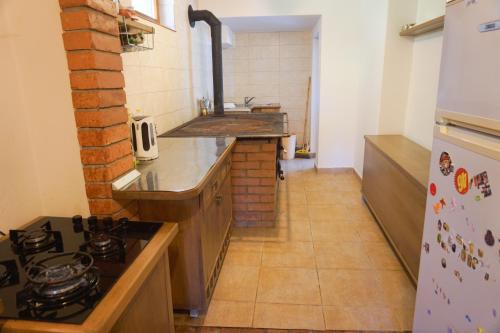 Dapur atau dapur kecil di 3A Guest House