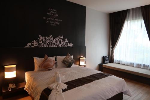 Postel nebo postele na pokoji v ubytování Paklop Resort