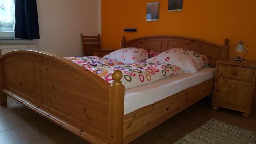 Postel nebo postele na pokoji v ubytování Haus Annegrete mit überdachter Terrasse zum Garten