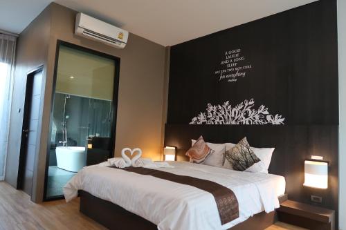 Giường trong phòng chung tại Paklop Resort