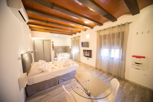 Postel nebo postele na pokoji v ubytování Estudios Rurales La Casa de Luis