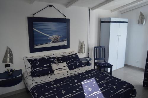 Кровать или кровати в номере Yacht Club Sal