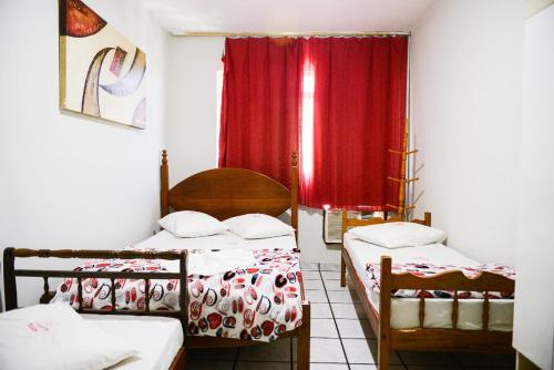 Postel nebo postele na pokoji v ubytování Hotel Aliança