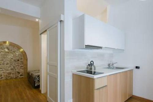 Η κουζίνα ή μικρή κουζίνα στο Giudecca Apartments
