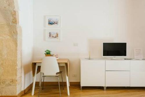 Μια τηλεόραση ή/και κέντρο ψυχαγωγίας στο Giudecca Apartments
