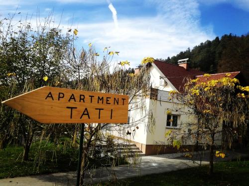 a sign in front of a house with a apartment hall at Apartment Tati in Dol pri Ljubljani