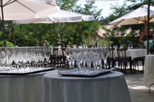 a group of wine glasses sitting on a table at Jubilee Hotel Troodos in Troodos