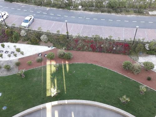 an aerial view of a garden and a road at San Alfonso del Mar Departamentos in Algarrobo