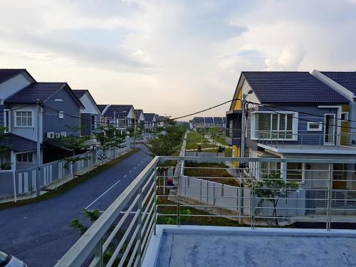 a view of a residential street with houses at Selendang In Krubong Near Std Hang Jebat, MITC & UTEM in Melaka