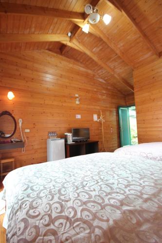 Cama o camas de una habitación en Qing Jing Xiao Taiyang Jingguan Homestay