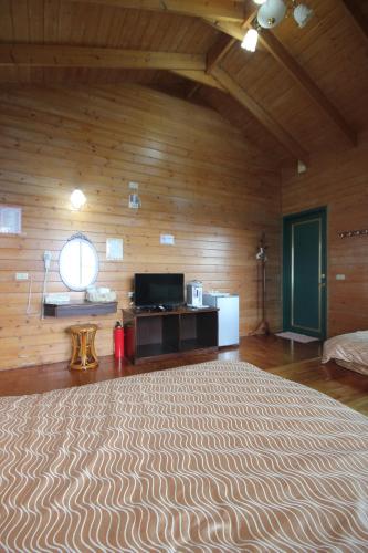 Cama o camas de una habitación en Qing Jing Xiao Taiyang Jingguan Homestay