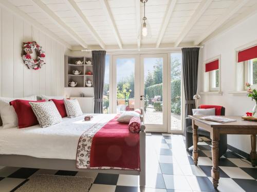 Postel nebo postele na pokoji v ubytování B&B Het Pronkbed