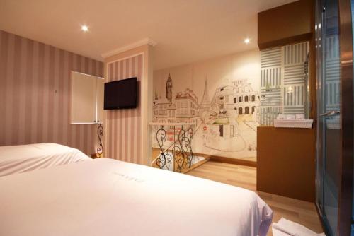 Posteľ alebo postele v izbe v ubytovaní Hotel Zara