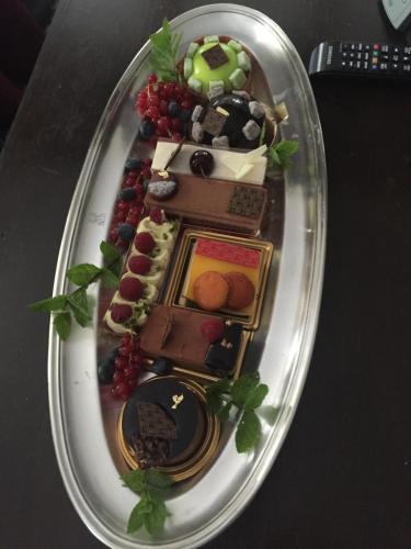 a plate of food with a train on it at Villa Rozmaryn & Gourmet in Mariánské Lázně