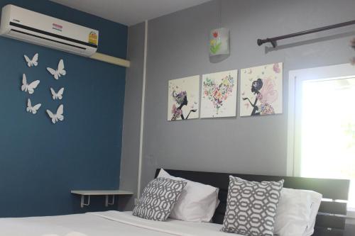 Ένα ή περισσότερα κρεβάτια σε δωμάτιο στο Krabi Nemo House