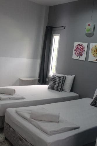 Ένα ή περισσότερα κρεβάτια σε δωμάτιο στο Krabi Nemo House