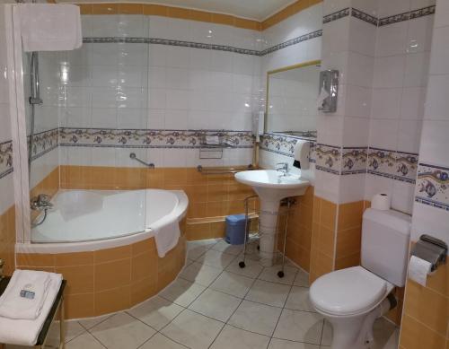 Ένα μπάνιο στο Chambre d'hôtes La Potinière