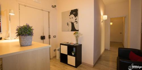 a room with a counter with a plant on it at SalernoPrestige rooms in Salerno