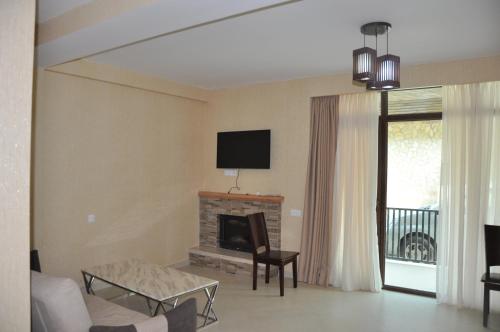 Μια τηλεόραση ή/και κέντρο ψυχαγωγίας στο Anna Apartaments on Didveli