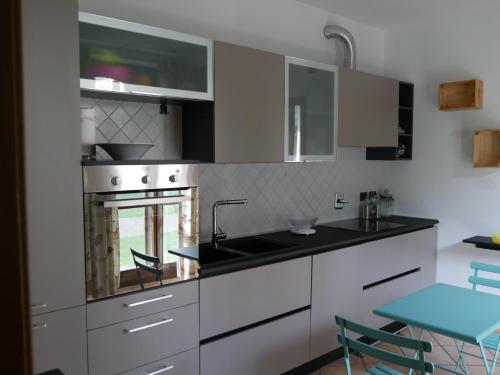 A cozinha ou cozinha compacta de La Maison du Soleil Appartamento Alba Pompeia