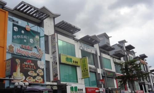 a building with signs on the side of it at Mahkota Cheras Sweet Condo 1-14 pax near MRT to KL in Kuala Lumpur