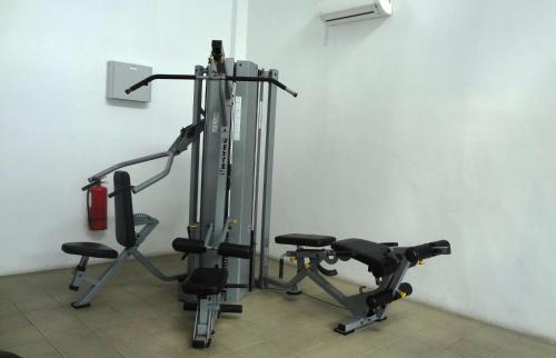 a room with a gym with two tread machines at Mahkota Cheras Sweet Condo 1-14 pax near MRT to KL in Kuala Lumpur