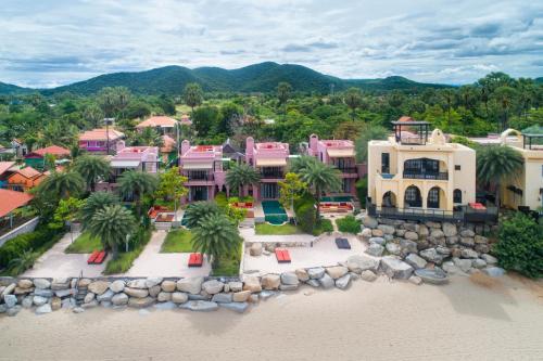 an aerial view of a house on the beach at Villa Maroc Resort in Pran Buri