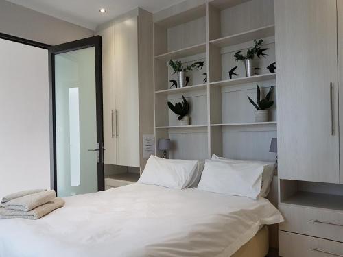 Krevet ili kreveti u jedinici u objektu Rieks van der Walt Self-Catering Apartment