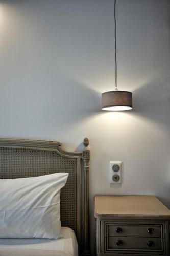 Cama o camas de una habitación en Hôtel Henri IV