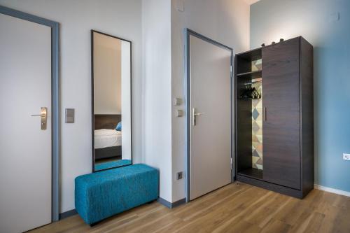 Letto o letti in una camera di Hotel Ruf