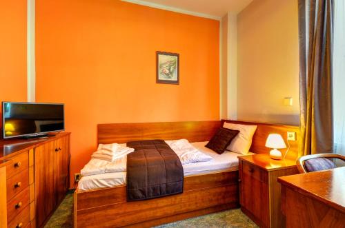 Hotel Pizzeria Istria tesisinde bir odada yatak veya yataklar