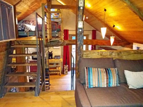 a room with a bunk bed and a staircase at La Maison du Haut Plessix in Clayes
